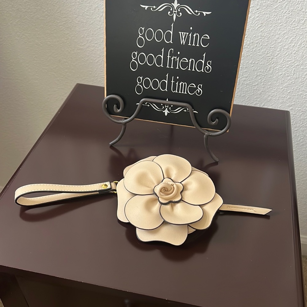 Cream leather rosette wristlet , keychain wallet